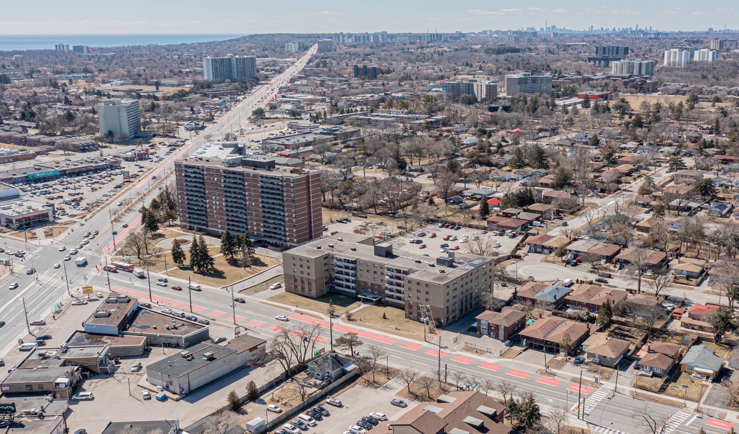 Aerial view over West Hill with 290 Morningside in the foreground, Lake Ontario to the left and the downtown Toronto skyline on the horizon